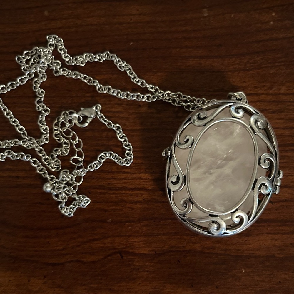 Silver locket with rose quartz pendant
